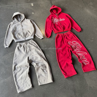 Ensemble de survêtement personnalisé pour homme, en molleton 100% coton épais, avec sweat à capuche zippé et pantalon de jogging brodé du logo.