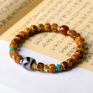 Bijoux haut de gamme de style tibétain original, sculptés sur os, avec le mantra à six syllabes, <span class=keywords><strong>dent</strong></span> de <span class=keywords><strong>tigre</strong></span> et perles Dzi disponibles - Product Image 1