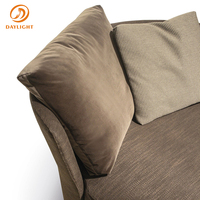 Fauteuil d'appoint moderne en tissu bouclé, fauteuil rond crème blanc avec courbes douces et base dissimulée, pour salon d'hôtel
