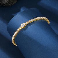 Bracelet tennis en chaîne de zircon étincelant, design géométrique luxueux, en cuivre plaqué or, bijoux de mode en gros