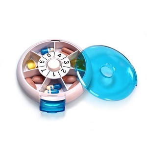 Boîte de rangement de pilules ronde portable 7 jours par semaine pour une gestion efficace des médicaments Boîte à pilules à capsules en plastique facile à ouvrir - Product Image 1