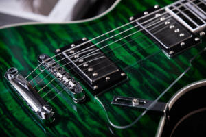 <span class=keywords><strong>LP</strong></span> Caoba Guitarra eléctrica de 6 cuerdas Brillo Sólido Top HPL Diapasón OEM Profesional - Product Image 4