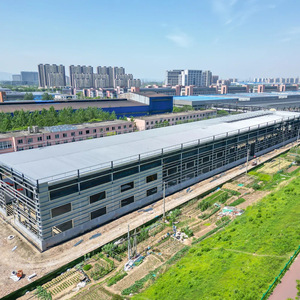Bâtiment d'entrepôt et d'usine en structure d'acier Jinshengtong, en acier au carbone, prêt à l'exportation, conception incluse - Product Image 2