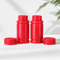 Vente en gros de pots en PET de 100 ml pour capsules, emballage rouge pour compléments alimentaires avec options d'étiquettes personnalisées