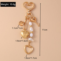 Porte-clés en alliage de zinc avec perles superposées, pendentif cœur, coquillage, étoile et lune plaqué or pour femme, décoration de sac à main