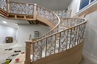 Escalier en colimaçon moderne en bois sur mesure fabriqué en usine dans le Jiangsu avec marches en bois massif pour villas de luxe