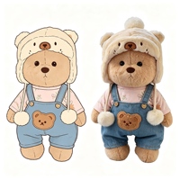 Peluche Ours Marron Adorable avec Chapeau de Trappeur et Salopette en Jean – Jouet en Peluche Doux et Tendance