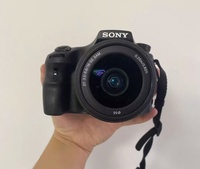 Appareil photo numérique d'origine de bonne qualité A65 avec objectif 18-55 mm, ensemble complet