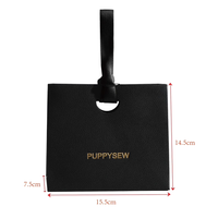 Sacs en papier texturé de luxe avec poignée en ruban satiné Impression dorée à chaud Options multicolores pour l'emballage cadeau de vente au détail haut de gamme