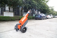 Mini tracteur de remorquage tout-terrain électrique Tugger nouvelle conception pour le transport dans les usines de fabrication de restaurants au détail