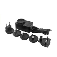 Prise interchangeable Ac Dc Alimentation 5v 6v 9v 12V 24V 1a 1.5a 2a 3a Adaptateur secteur universel