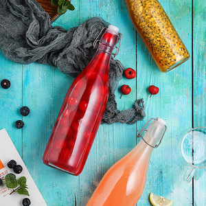 Amazons Venta caliente 2024 personalizado 250ml 500ml 750ml 1000ml botella de bebida con tapa abatible de vidrio - Product Image 3