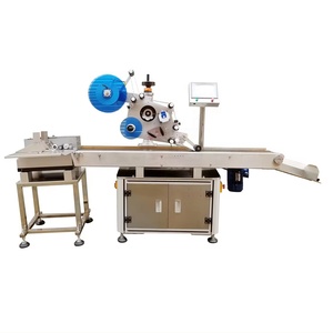 Machine d'étiquetage automatique à adhésif pour sachets plats/livres/couvercles de barils - Product Image 1