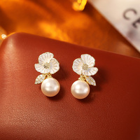 OWNSWING S925 anting-anting mutiara bunga jarum perak anting-anting manis mewah ringan perhiasan personalisasi Temperamental