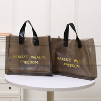 Sacs en plastique réutilisables élégants et minimalistes gris fumé transparents avec impression personnalisée et poignées noires, haute capacité de charge