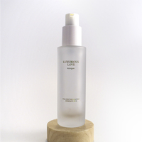 Ensemble d'emballage cosmétique en verre dépoli de luxe bouteille à pompe de lotion en bambou et pot de crème avec couvercle en bambou
