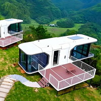 Maison Capsule Spatiale Moderne Minimaliste Écologique pour Studio de Yoga en Pente, Isolée, Résistante aux Intempéries et Ignifuge