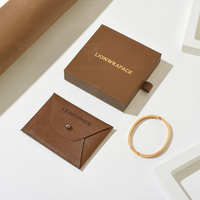 Boîte d'emballage de bijoux en papier personnalisée haut de gamme en gros, épaisseur 2 mm, matériaux recyclés, insert en mousse pour présentation en magasin et cadeaux