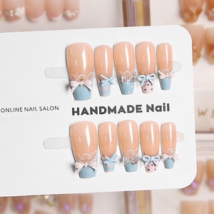 <span class=keywords><strong>Uñas</strong></span> postizas artesanales medianas con diseño de ataúd, en tono nude, con encaje francés, lazo 3D azul bebé y lunares, estilo lindo y kawaii, para uso diario y fiestas. - Product Image 5