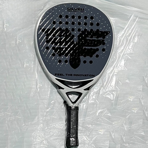 Raquette <span class=keywords><strong>de</strong></span> padel professionnelle <span class=keywords><strong>de</strong></span> qualité supérieure, technologie brevetée Rd <span class=keywords><strong>Technology</strong></span>, noyau en EVA souple à 15 degrés, hybride Kevlar, forme ronde. - Product Image 1
