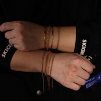 Bracelet empilable en acier inoxydable plaqué or 18 carats, motifs géométriques variés, résistant à l'eau et hypoallergénique, ne ternit pas