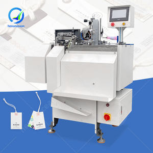 Machine automatique OCEAN pour l'insertion de fil et la fixation des étiquettes de vêtements - Product Image 1