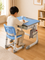Ensemble bureau et chaise pour enfants bleu clair avec pieds en métal en forme de C, hauteur réglable et base à quatre points pour une utilisation en classe