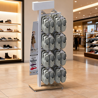 Présentoir à chaussures personnalisé double face en métal à 4 niveaux pour magasin de détail Showroom POS Shoe Slipper Store Display Stand