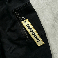 Parka à capuche en fausse fourrure avec logo personnalisé, fermeture éclair, broderie de logo au dos, manteau cargo d'hiver en toile noire surdimensionné avec étiquette tissée
