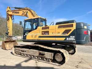 Excavatrice sur chenilles Hyundai 330 d'occasion à prix abordable avec moteur Cummins, engrenages et pompe - Matériel de construction - Product Image 4