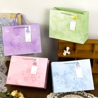 Sacs cadeaux en papier floral de luxe avec logo personnalisé, poignées et impression sur carton, sacs de boutique pour le shopping