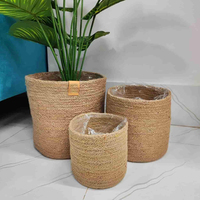 Panier à linge ovale moderne et écologique en jute et coton tressé avec poignées robustes, organisateur de rangement décoratif pour vêtements