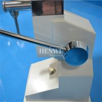 Machine de remplissage liquide manuelle Henwi A01 One Nose 5-50ml pour petites bouteilles d'huile essentielle, de parfum et de sérum.