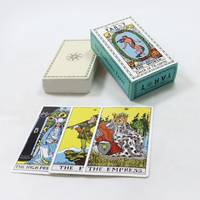 Fabricant de cartes de tarot oracle à impression personnalisée imprimant des cartes de tarot voyants légers avec guide dans une boîte en grille