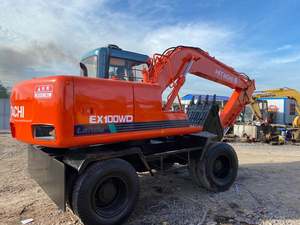 Excavatrice sur pneus hydraulique HITACHI EX100WD d'occasion, 10 tonnes, moteur modèle 2022, boîte de vitesses, pompe, moteur, capacité de la benne de 0,4 m, puissance de 55 kW - Product Image 3