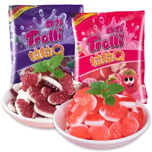 Venta al por mayor Fruity Gummy Candy 60g Sweet & Sour Fresa Uva Sabor Fruit Shape Snacks exóticos empaquetados en bolsas