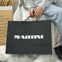 Personnalisation de sacs en papier de vente directe d'usine avec votre propre logo Emballage de vêtements et de chaussures Sac en papier noir