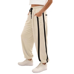 <span class=keywords><strong>Pantaloni</strong></span> Sportivi Casual <span class=keywords><strong>Bianchi</strong></span> <span class=keywords><strong>con</strong></span> Strisce a Contrasto, Vita Elastica e Coulisse, Gamba Larga e Vestibilità Comoda - Product Image 1