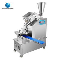 Machine automatique en acier inoxydable pour la fabrication de dim sum, siopao, pains farcis à la vapeur et momo/baozi du Népal