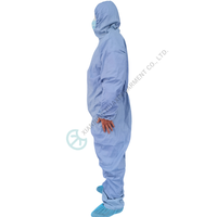 Combinaison de protection jetable non tissée ignifuge et imperméable avec capuche et bottes