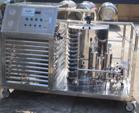 Machine multifonctionnelle pour la fabrication de parfums, réservoir de mélange de liquides parfumés avec fonction de filtration et de congélation