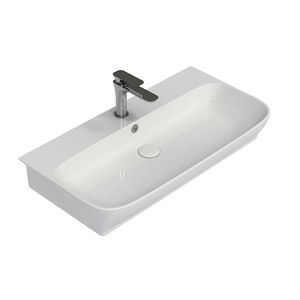 Fournisseur de lavabos en céramique minimalistes à un seul trou, finition polie, pour salles de bain commerciales - Product Image 1