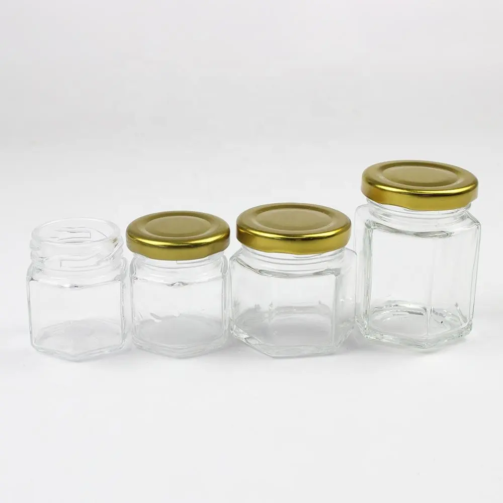 Tarro de vidrio transparente con tapa de Metal para almacenamiento de alimentos, tarro de miel a la venta