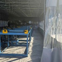 Tente motorisée imperméable en PVC, design rétractable pour atelier d'usine, structure en acier galvanisé, roues en nylon, utilisation toutes saisons