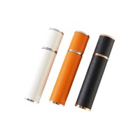 En stock – Flacon cylindrique en cuir de 10 ml pour échantillon de parfum, vaporisateur portable, mini flacon vide à pression pour liquides