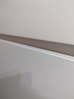 Boucle de fixation pour plafond à clipser de type G avec design moderne pour les espaces commerciaux et résidentiels, idéale pour les centres commerciaux, les hôtels et les ateliers.