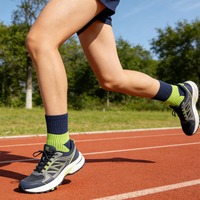Chaussettes de sport en gros pour hommes, épaisses, en tissu éponge, avec revers tricoté, respirantes, style mi-mollet pour la performance