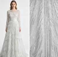 Dentelle en plumes d'autruche lourdes, franges blanches, sequins et perles sur tulle, directement de l'usine, OEM ODM personnalisé pour robe de mariée