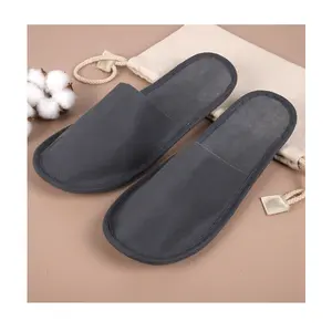 Best price new year white black single use slipper closed toe disposable hotel non-woven slippers with custom logo