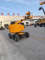 Chariot élévateur à ciseaux diesel/électrique autopropulsé à haute efficacité avec rails de sécurité, hauteur de plateforme de 10 m, portée de 16,5 m, certifié CE